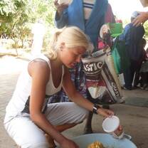 Volunteer eating in South Africa