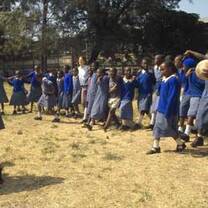 Volunteers with children in Kenya
