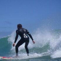 A volunteer surfing in Cape Town