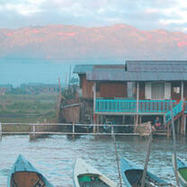 view of Thai finish boats and house