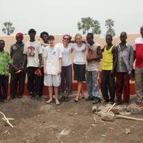 Volunteers with locals in Ghana