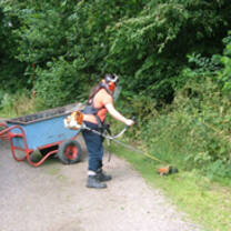 Volunteer gardening outside