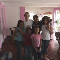 Volunteer with five kids