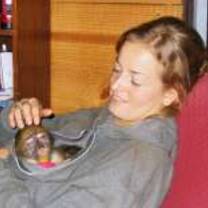Volunteer holding a small Baboon