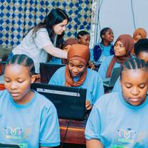 One of our interns at the class, training girls computer