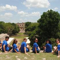 Students looking over ruins in Merida