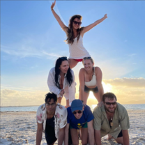 A group of students making a human pyramid