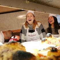 Gap year participants making pizza in Rome