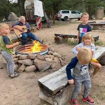 Kids by a campfire