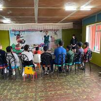 Volunteers teach children through a variety of programs.