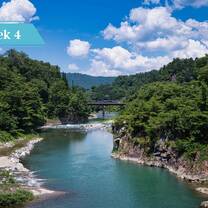 View of peaceful river in the Japanese countryside.