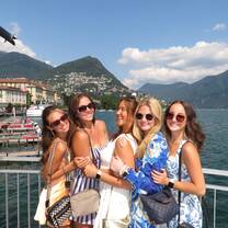Students enjoying scenic views with the Italian coast in the background during their study abroad program