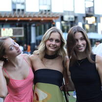 Students celebrating their study abroad graduation with a photoshoot.