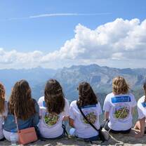 Students enjoying the panoramic view of the Italian Alps during their study abroad trip.