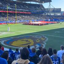 International students attending a football game