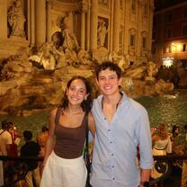 Students visiting the Trevi Fountain at night while exploring Rome during a study abroad experience