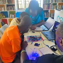 Youth parcticipating in robotics class