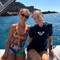 two divers on a boat