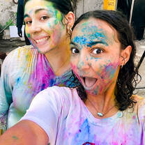 Students participating in Holi.