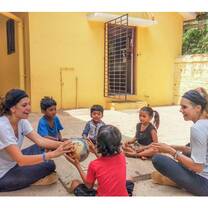Volunteers with students in India