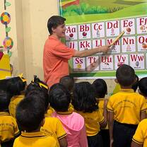 Volunteer teacher in class