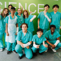 Students practising trauma and emergency care skills during a supervised medical summer school in the UK