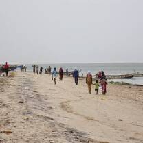 Walking along the beach in Dakar, the capital