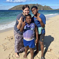 Me, AJ, and Mark walking on the beach!