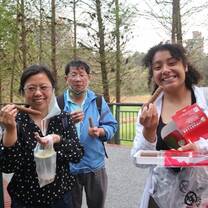 In this picture I am sharing delicious egg rolls with my friend Lynn parents! Lynn invited me to her home in Taichung, and her parent's surprise me with a trip to the beautiful Sun-Moon lake! Lynn was my language partner in the Fall semester. Lynn also became a very special friend. I love Lynn so much! 