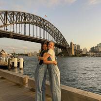 Enjoying views of the Harbour Bridge and Opera House with friends 