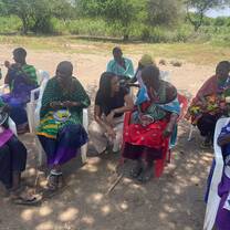 a photo taken with the women group in maasai