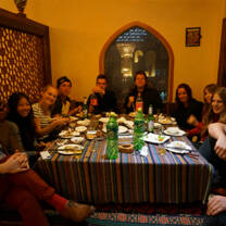 group of  interns eating chinese food