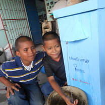 Children in Bluefields, Nicaragua testing out a new blueEnergy water filter