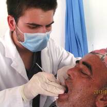 dental intern doing an exam