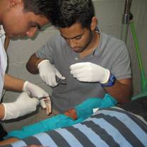 medical interns operating on patient