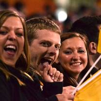 UC students cheering for the University of Canberra Brumbies