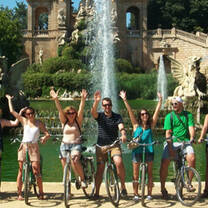 group of students in front of a fountain