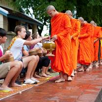 students meeting monks