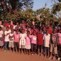 Volunteers work with orphans in Uganda through Volunteers for Peace