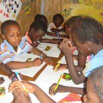 Volunteer with children in Senegal
