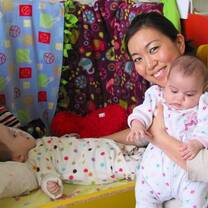 Volunteer with children in the orphanage in Romania